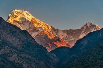 Fototapeta premium Beautiful view of sunrise of Annapurna South in Kaski region Pokhara Nepal