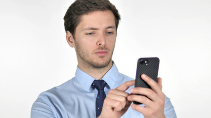 Young Businessman Using Smartphone on White Background