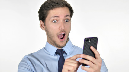 Wow, Astonished Young Businessman Using Smartphone on White Background