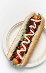 classic hot dog with frankfurter sausage and sauces