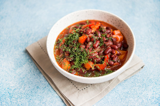 Lobio is a popular Georgian dish of red beans, vegetables and herbs with traditional Georgian lavash shotis Puri.