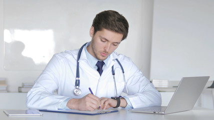 Doctor Writing Prescription for Patient, Medical Documents