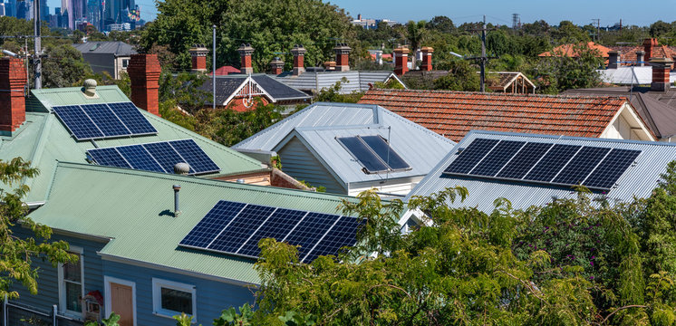 Solar panels on suburban house roofs in Melbourne, Australia
