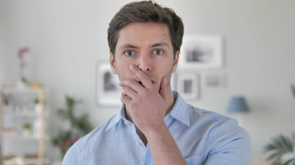 Handsome Young Man Surprised by Events