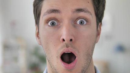 Wow, Face of Young Man Wondering in Shock