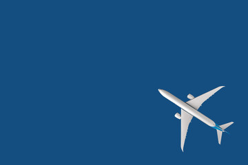 Model plane, airliner, airplane on blue background. travel and transportation concept