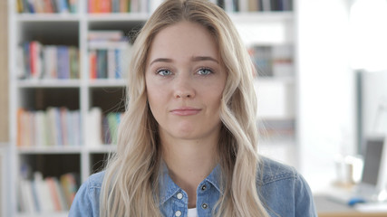 Young Blonde Woman Gesturing No by Shaking Head