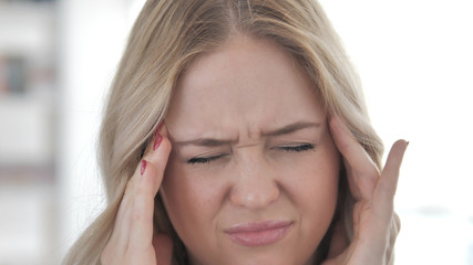 Close Up of Woman with Headache and Stress