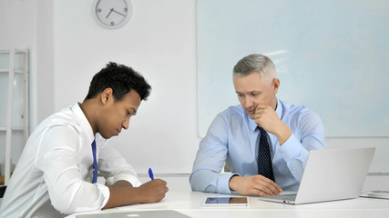 Boss, Businessman Giving Dictation to Employee at Work, Paperwork