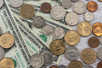 US 1 dollar bills with coin cent on wooden desk. same money conccept.