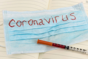 Search virus vaccine coronavirus as danger diseaseas concept. Fasical mask with text covid 19and...