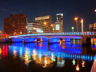 Nicely illuminated bridge at night in Japan