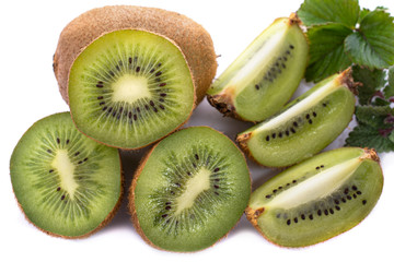 Fototapeta premium Kiwi fruit with pieces isolated on a white background, close -up.