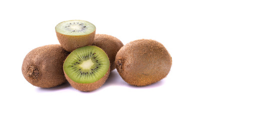 Kiwi fruit with pieces isolated on a white background, close -up.