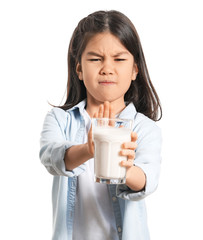 Cute Asian girl with dairy allergy on white background