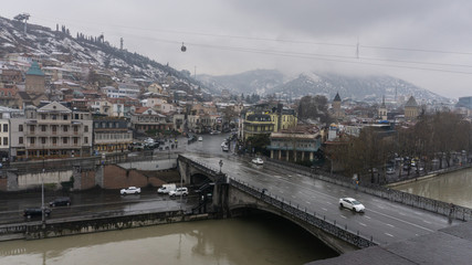 Fototapeta na wymiar Tbilisi. Georgia country. March 2020. The old city. Salalaki District. Suddenly in mid-March it started to snow