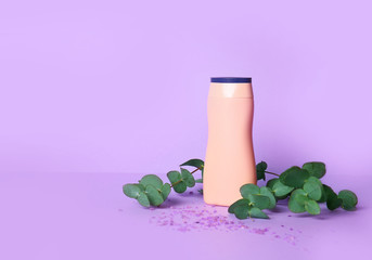 Shampoo with herbal extract on color background