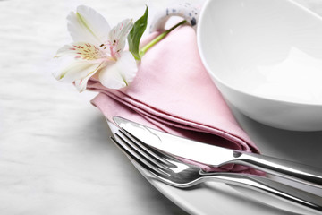 Beautiful table setting with floral decor, closeup