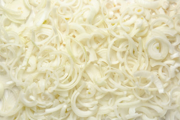 Fresh cut raw onion as background