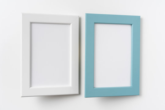 top view of two black and green wood photo frame