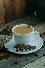 a Cup of coffee on the wooden windowsill