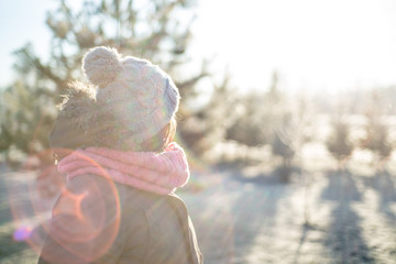 Girl during sunrise in backlight