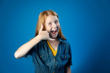 Teenager Girl Doing the shaka hand gesture Call me sign