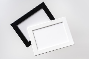 top view of two black and white photo frame on air