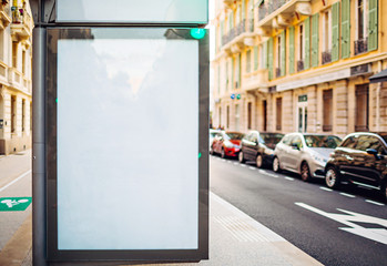 Blank vertical lightbox mock-up at a bus stop in Nice, France. All reflections saved. Perfect for any lettering