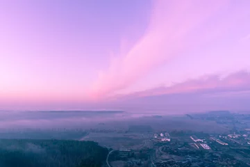 Fototapeten Early misty morning. Sunrise in countryside. Rural landscape in early spring. Aerial view © vvvita