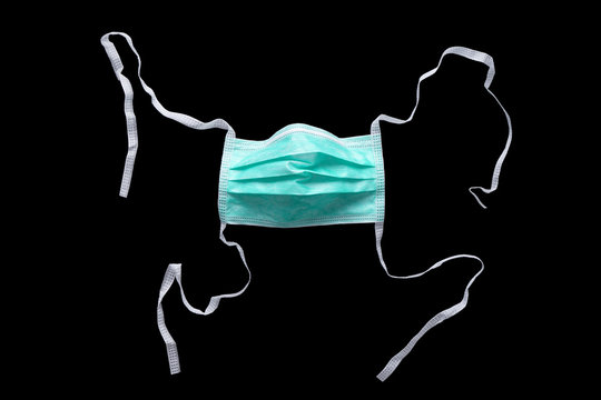 Mask for corona covid 19, isolated on black background - Powered by Adobe