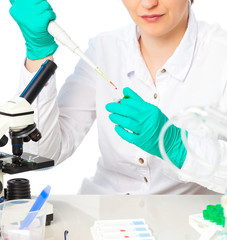 Scientist holds and examine samples in a laboratory