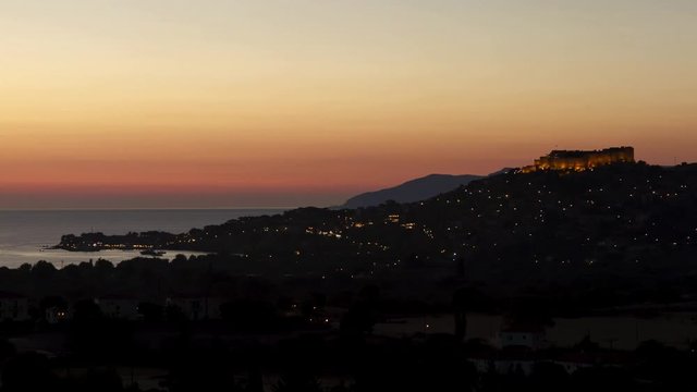 Time lapse from day to night with the castle and port of Molyvos, Lesvos, Greece