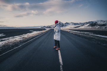 girl standing on the road