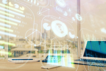 Double exposure of desktop computer and technology theme hologram. Concept of software development.