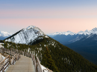 Boardwalk on Sulphur Mountain connecting Gondola landing at sunset in Banff, Canada.  Gondola ride to Sulphur Moutain overlooks the Bow Valley and the town of Banff..