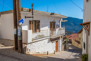 Fototapeta na wymiar Street view of Arachova village, a popular winter destination in Parnassos mountain in Greece