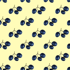 Seamless pattern of blue grapes isolated on light yellow. Food background. Flat lay
