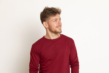 Fototapeta premium Attractive young guy with a red T-shirt