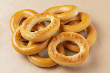 Heap confectionery bagels on parchment paper