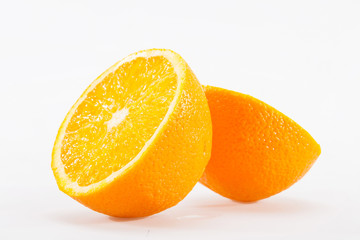 Halved orange isolated on the white background