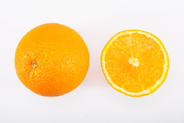 Orange and orange slice isolated on the white background