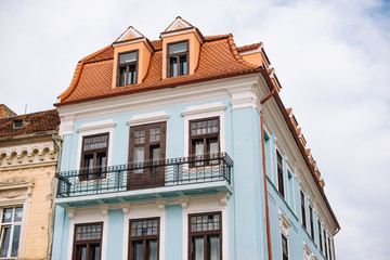 Brasov, Romania, 4 march 2020, photo of beautiful old blue house, medieval architecture
