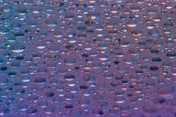 blue water drops on a surface