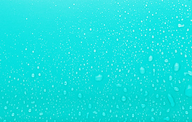 Drops of water on a color background. Blue. Toned - 331173674