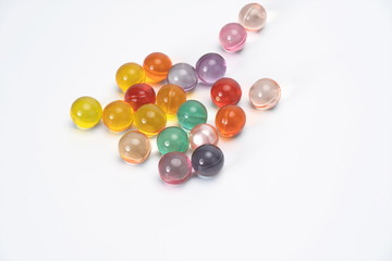 The colorful fragrant beads with all kinds of fragrance in the white background can make the air fresh and let the opposite sex like you, so that you can put it in the car or the room