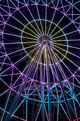 luminous ferris wheel at night