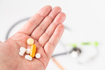 Many different tablets held in one hand