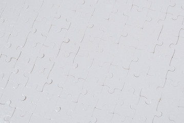 White puzzle background. Top view.