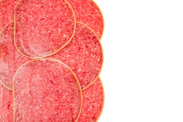 Salami slices isolated on white background.